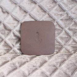 Coasters in leather with anchor motif