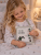 Dinosaur tooth fairy cushion