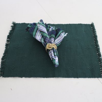 Zoom bild av tartan mönstrad duk med fransar